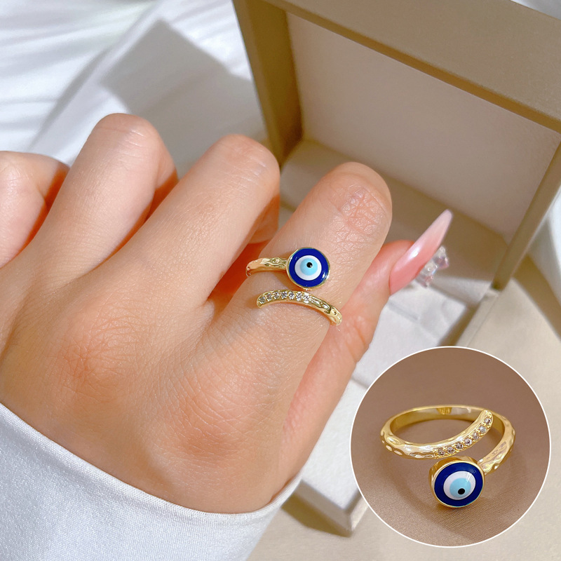 Cross -border hot -selling European and American personality evil eye ring, star moonlight blue eye inlaid diamond opening can adjust the ring